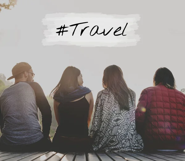 Young people sitting on wooden planks — Stock Photo, Image