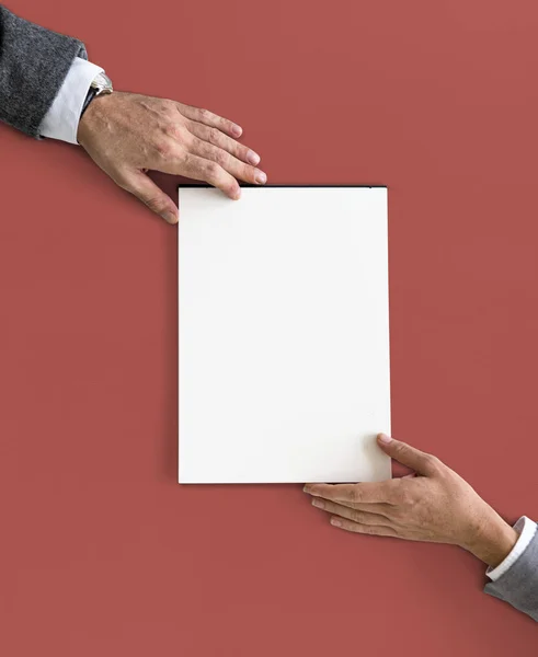 Hands holding white paper blank — Stock Photo, Image