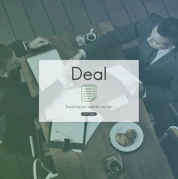 Businesmen shaking hands at meeting — Stock Photo, Image