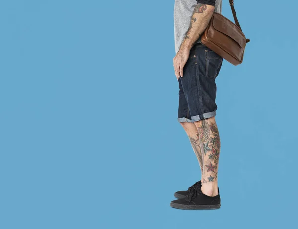 Mężczyzna nogi z tatuażami — Zdjęcie stockowe