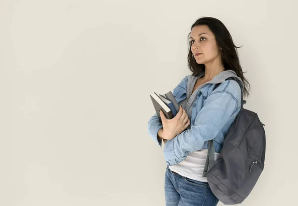 Estudante com mochila segurando livros — Fotografia de Stock