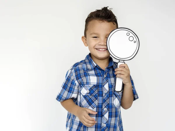 Jongen op zoek in Vergrootglas — Stockfoto