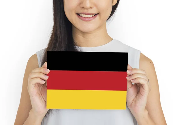 Junge Frau mit deutscher Fahne. — Stockfoto