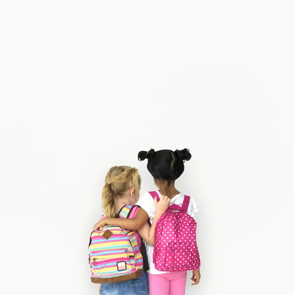 Meninas com sacos em estúdio — Fotografia de Stock