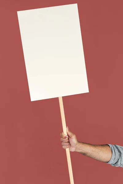 Mano sosteniendo banner en blanco —  Fotos de Stock