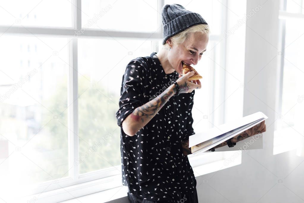 hipster woman eating pizza 