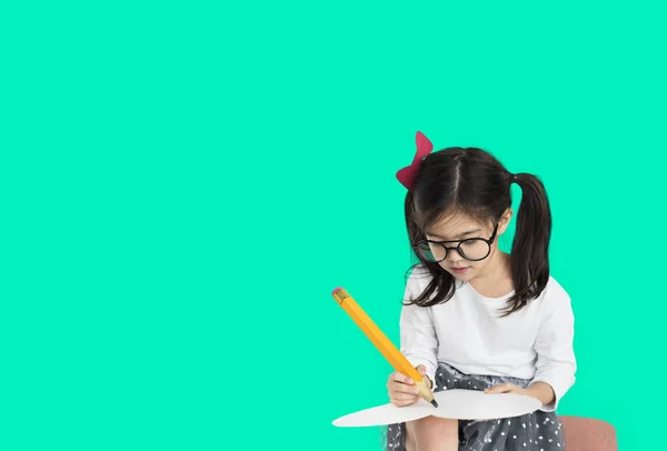 Little girl writing — Stock Photo, Image