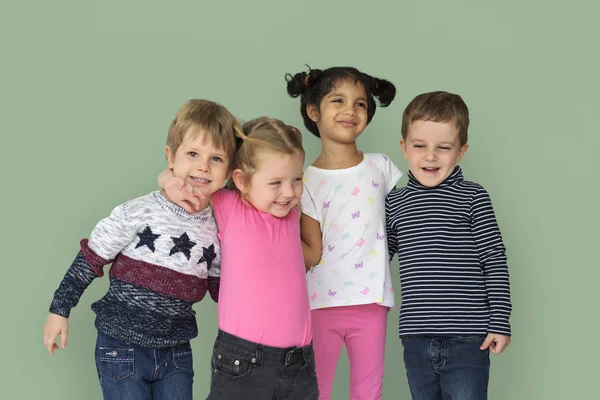 Adorable friendly children in studio — Stock Photo, Image