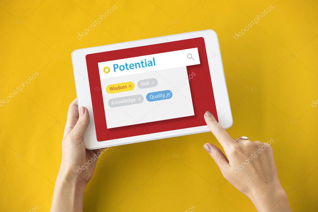 person holding digital tablet