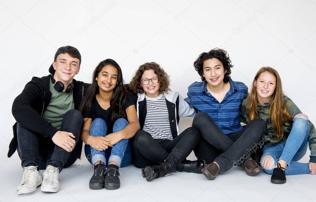 Students sitting on floor  