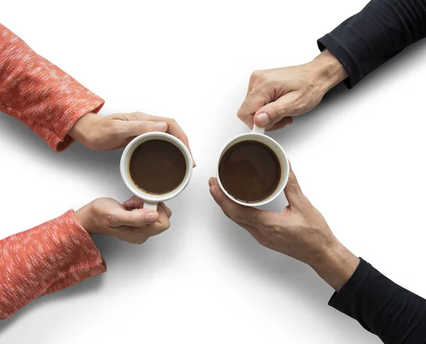Mãos humanas segurando xícaras de café — Fotografia de Stock
