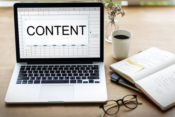 Table with opened laptop notebook — Stock Photo, Image