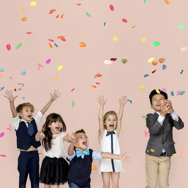 Children Celebrating with confetti — Stock Photo, Image