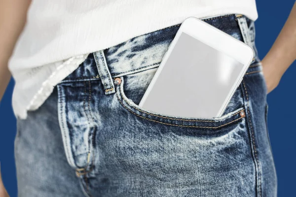 Digital smartphone in jeans pocket — Stock Photo, Image