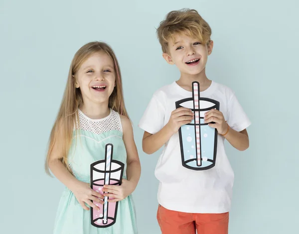 KIds Holding Paper Drinks Stock Picture