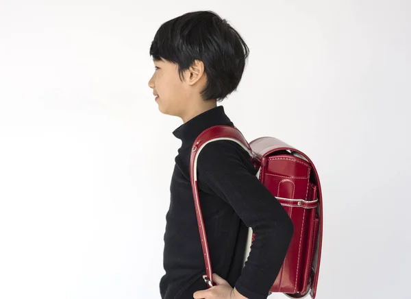 Menino da escola com mochila — Fotografia de Stock