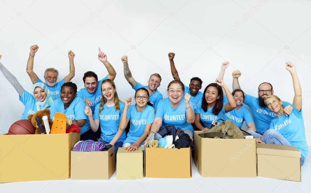 diverse volunteers with boxes 