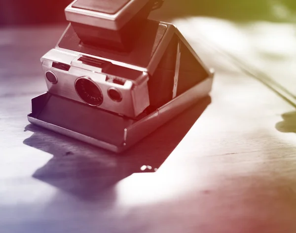 Retro instant photo camera — Stock Photo, Image