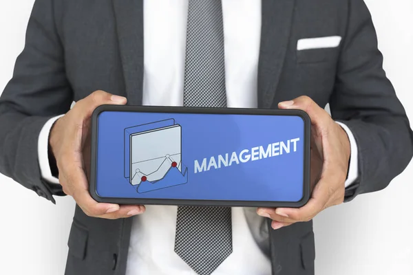 Businessman holding digital device — Stock Photo, Image