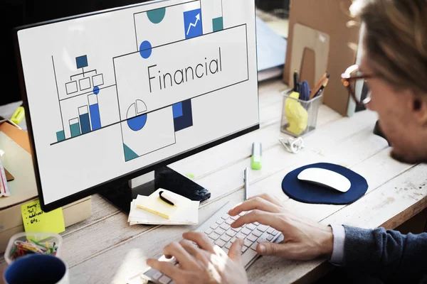 Man sitting against computer — Stock Photo, Image