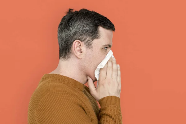 Man Sneezing in Napkin — Stock Photo, Image