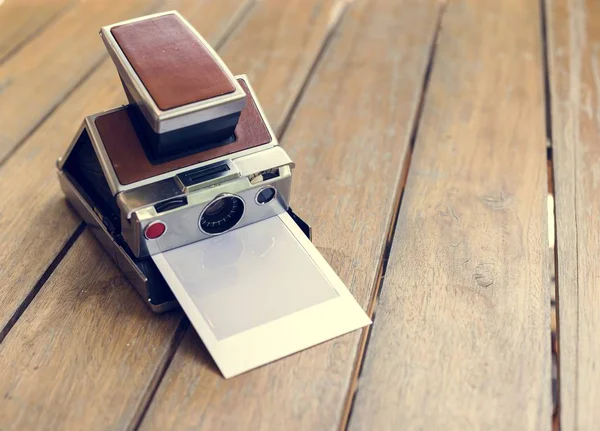 Retro instant photo camera — Stock Photo, Image