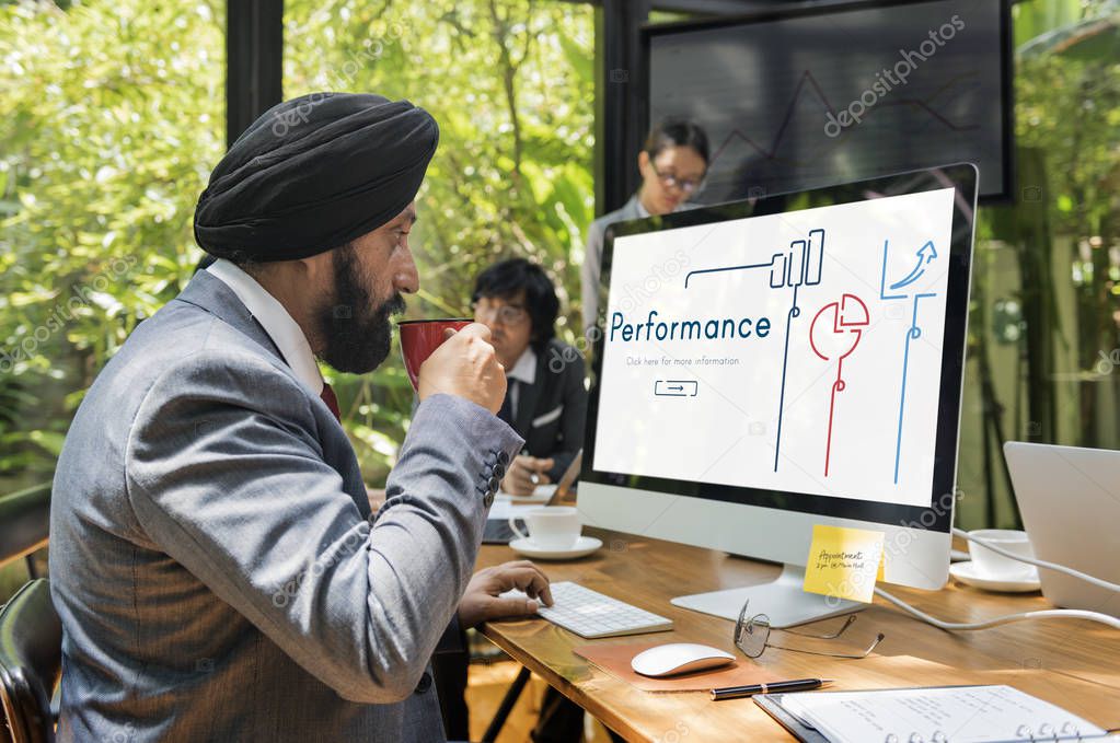 Businessman working on computer in the office, Performance Concept on monitor