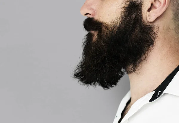 Giovane con i baffi e la barba — Foto Stock
