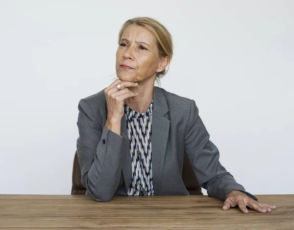 Thoughtful mature woman — Stock Photo, Image