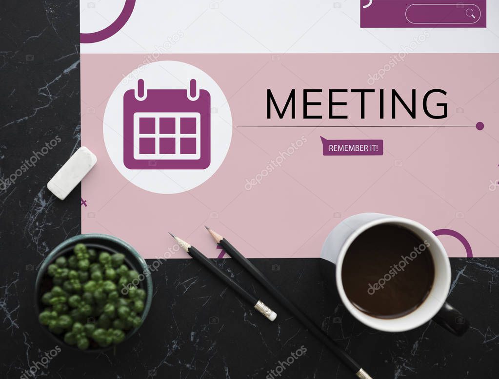 table with coffee cup and green plant