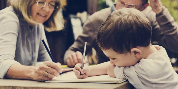 Grandparents and grandson drawing — Stock Photo, Image