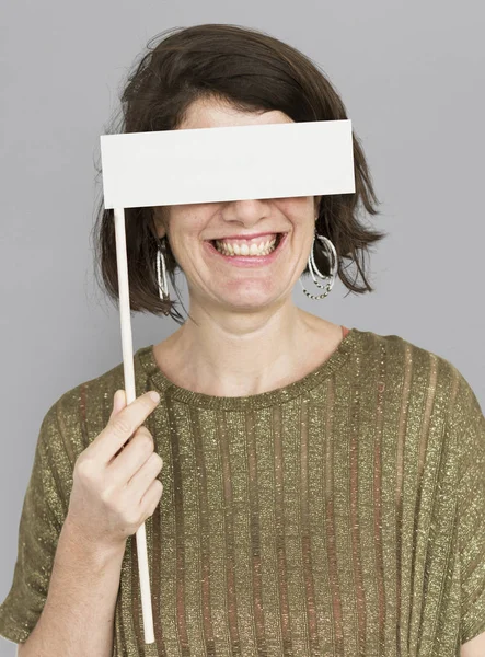 Mulher cobrindo olhos com banner — Fotografia de Stock