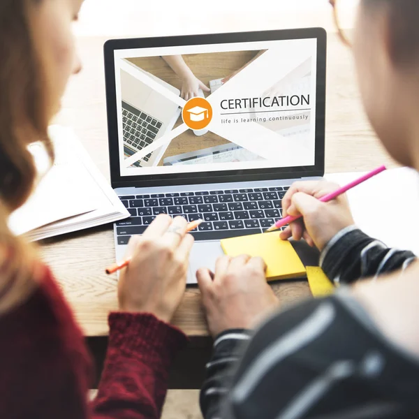 Two girls using laptop — Stock Photo, Image