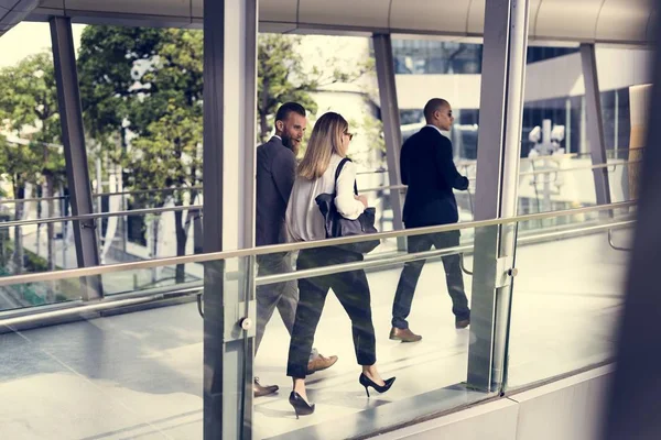 Business people walking in street — Stock Photo, Image