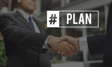 toplantıda el sıkışan iş adamları