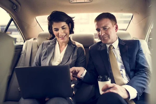 Business People working in car — Stock Photo, Image