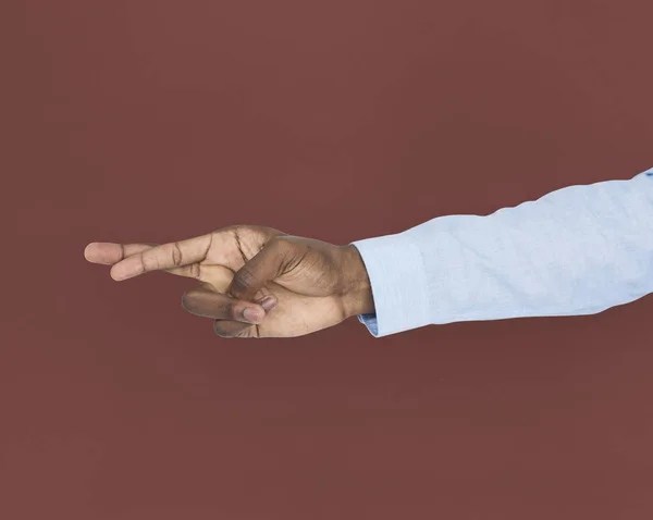 Emberi kéz mutató ujjak keresztezett — Stock Fotó