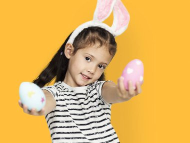 cute little girl with easter eggs