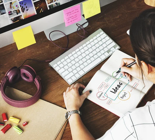 Designer woman writing — Stock Photo, Image