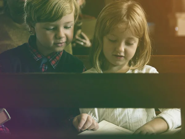 Kids Reading Bible in the Church — Stock Photo, Image