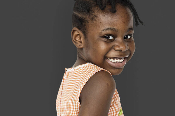 Adorable Little Girl in Dress Smiling, Face Expression, Studio portrait