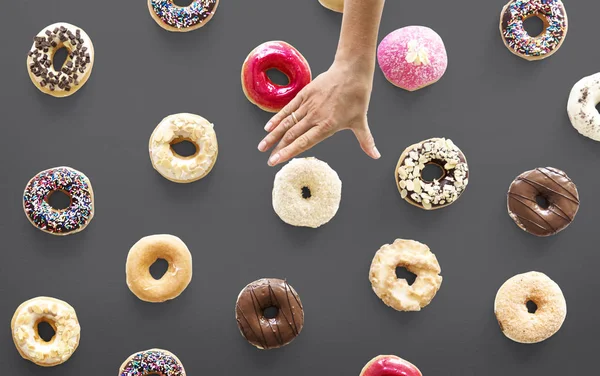 Hand holding sweet donut — Stock Photo, Image