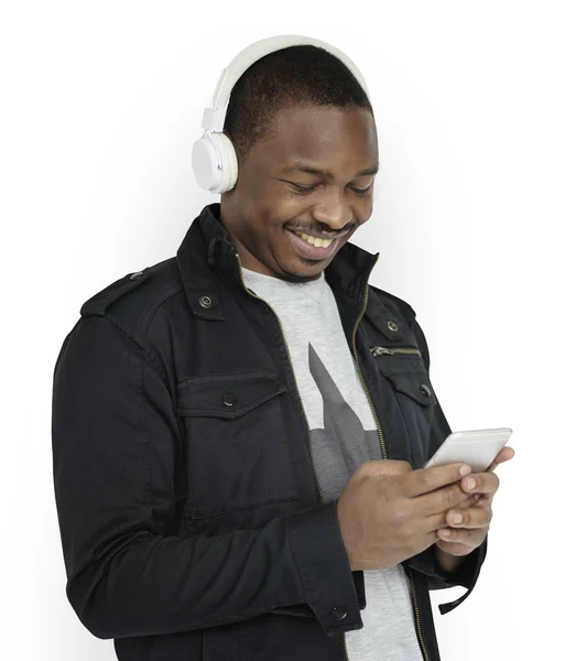 Man in headphones listening music — Stock Photo, Image