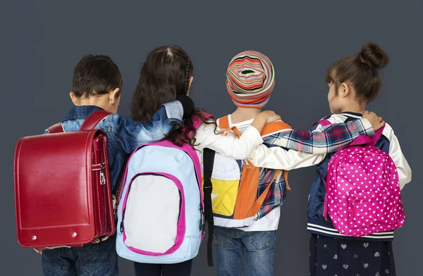 School children with backpacks — Stok fotoğraf