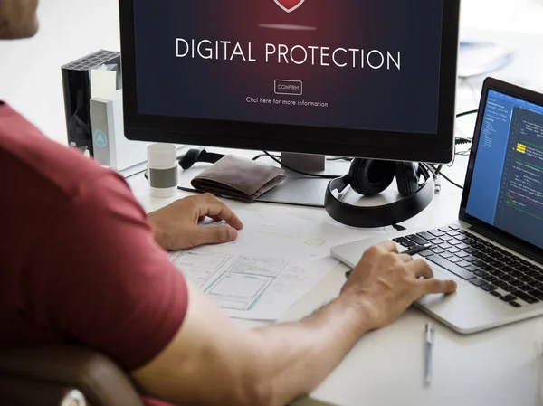 Man using laptop at workplace table — Stock Photo, Image