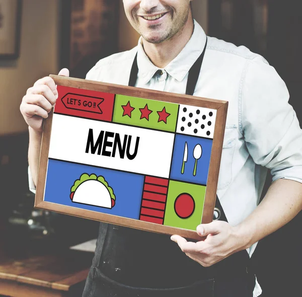 Man in black apron holding poster — Stock Photo, Image