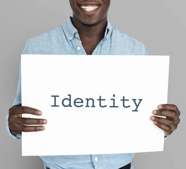 Man holding placard — Stock Photo, Image