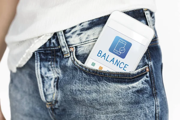 Smartphone i fickan på jeans — Stockfoto