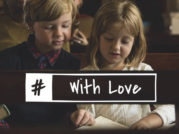 Children praying in church — Stock Photo, Image