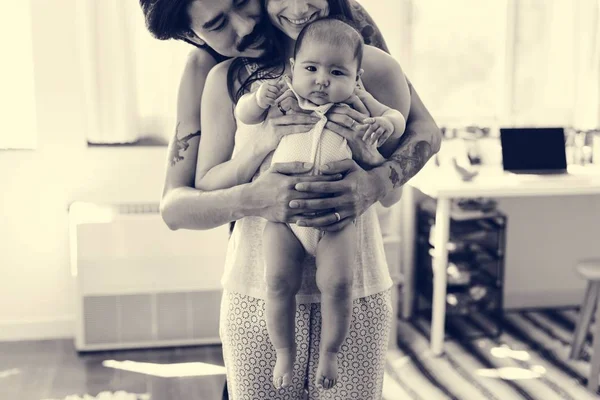 Parents holding newborn baby — Stock Photo, Image